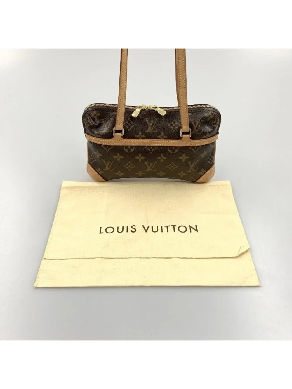 Louis Vuitton Monogram Mini Kousan Bag
